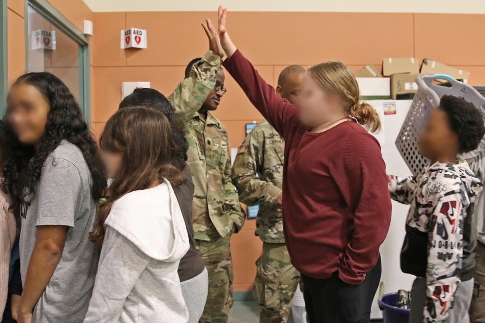 593d ESC Unit Ministry Team Joins Thompson Elementary Students for Dia De Los Muertos Lunch