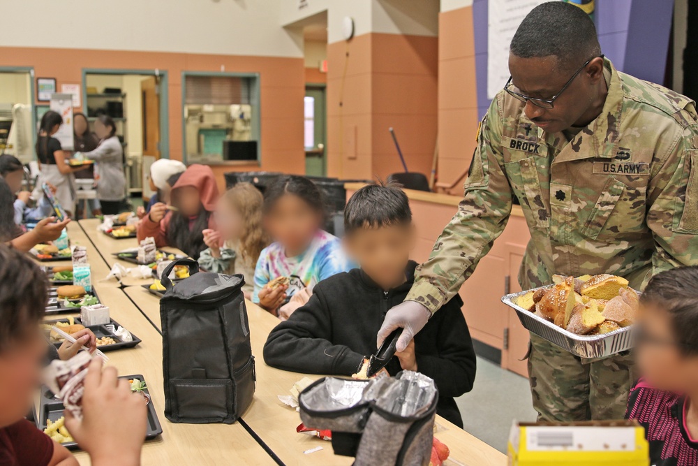 593d ESC Unit Ministry Team Joins Thompson Elementary Students for Dia De Los Muertos Lunch