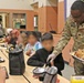 593d ESC Unit Ministry Team Joins Thompson Elementary Students for Dia De Los Muertos Lunch