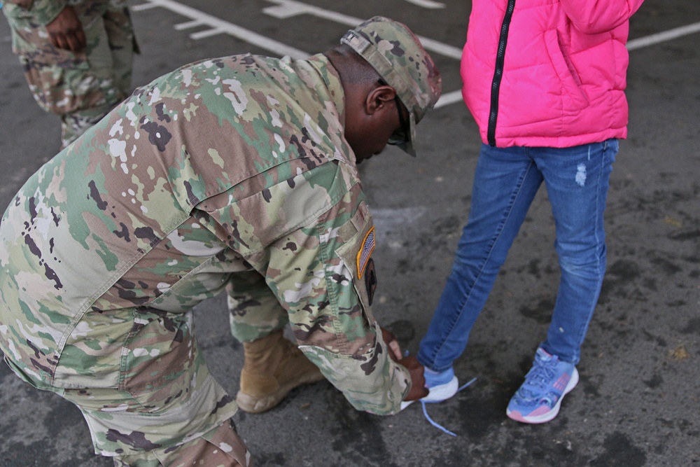 593d ESC Unit Ministry Team Joins Thompson Elementary Students for Dia De Los Muertos Lunch