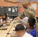 593d ESC Unit Ministry Team Joins Thompson Elementary Students for Dia De Los Muertos Lunch