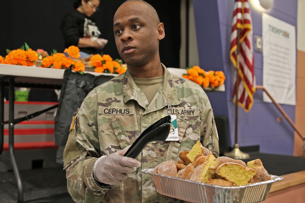 593d ESC Unit Ministry Team Joins Thompson Elementary Students for Dia De Los Muertos Lunch