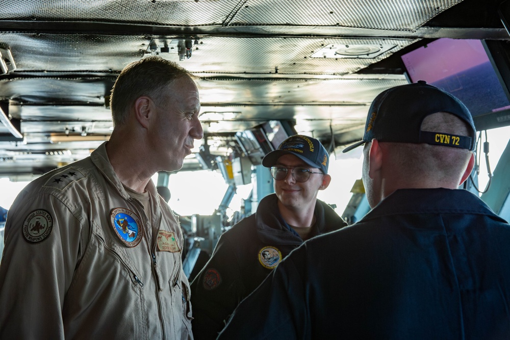 Vice Adm. George Wikoff, commander, U.S. Naval Forces Central Command and U.S. 5th Fleet, visits USS Abraham Lincoln