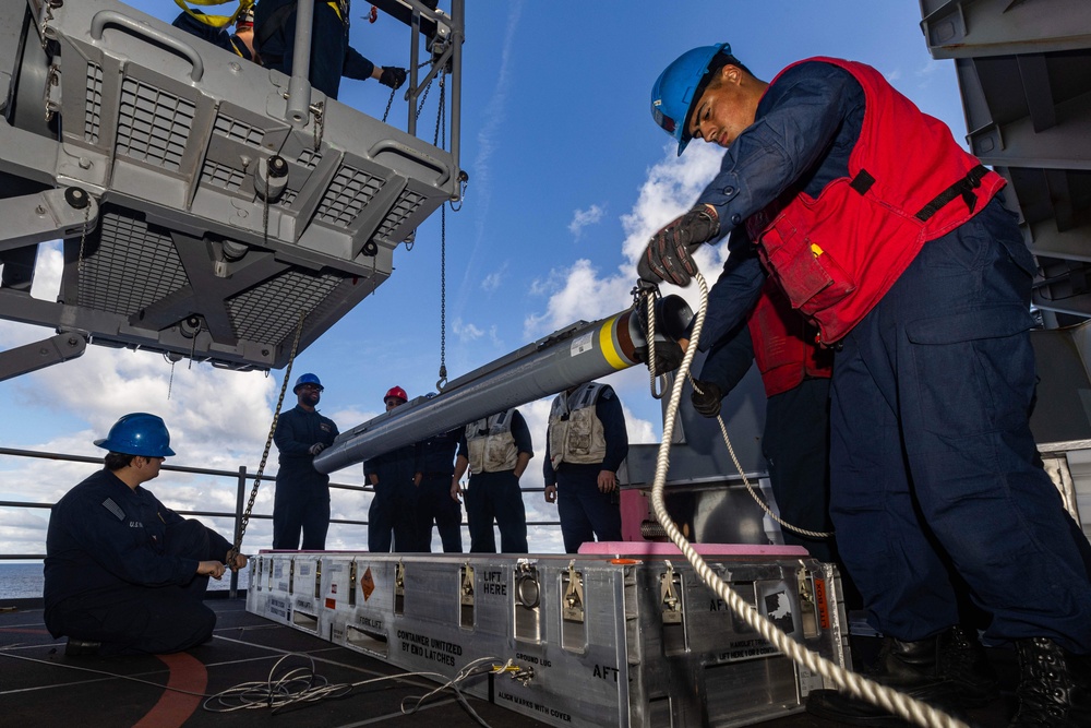 USS Gerald R. Ford (CVN 78) Sailors Load RAM Launcher