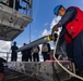 USS Gerald R. Ford (CVN 78) Sailors Load RAM Launcher