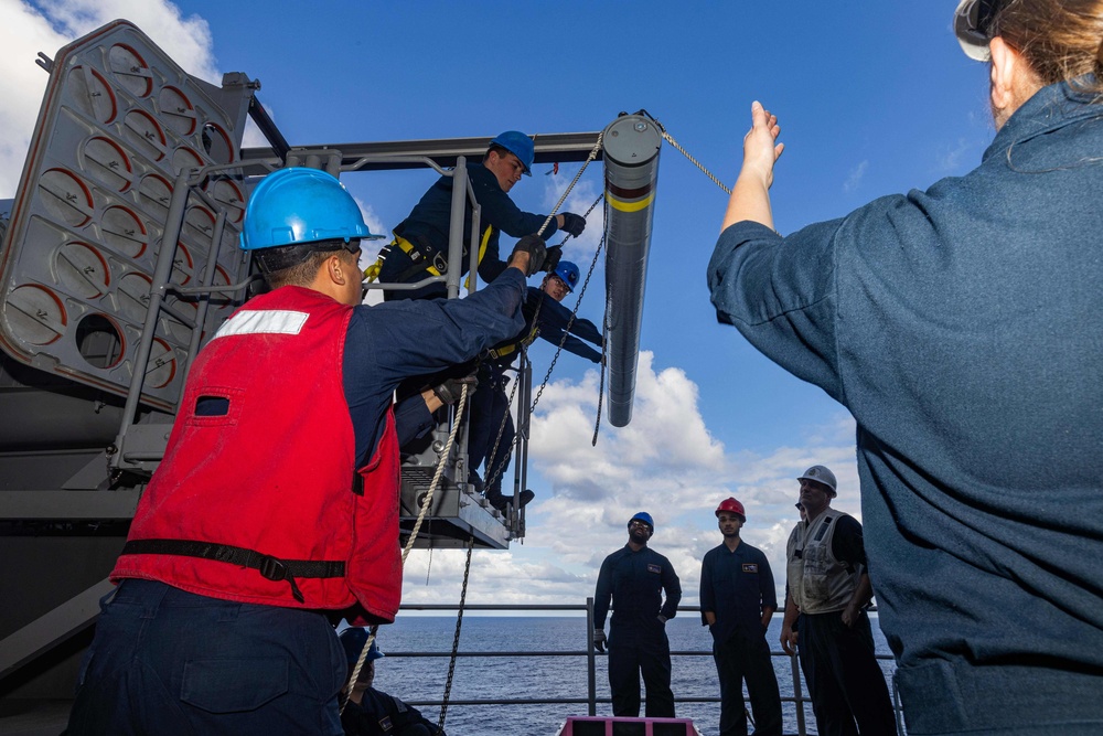 USS Gerald R. Ford (CVN 78) Sailors Load RAM Launcher