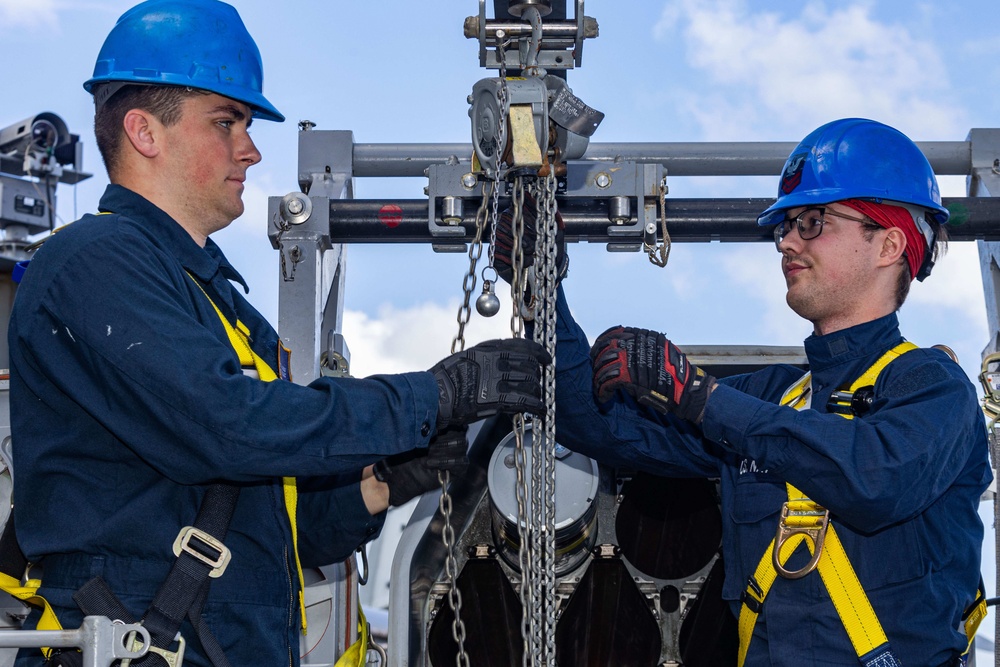 USS Gerald R. Ford (CVN 78) Sailors Load RAM Launcher