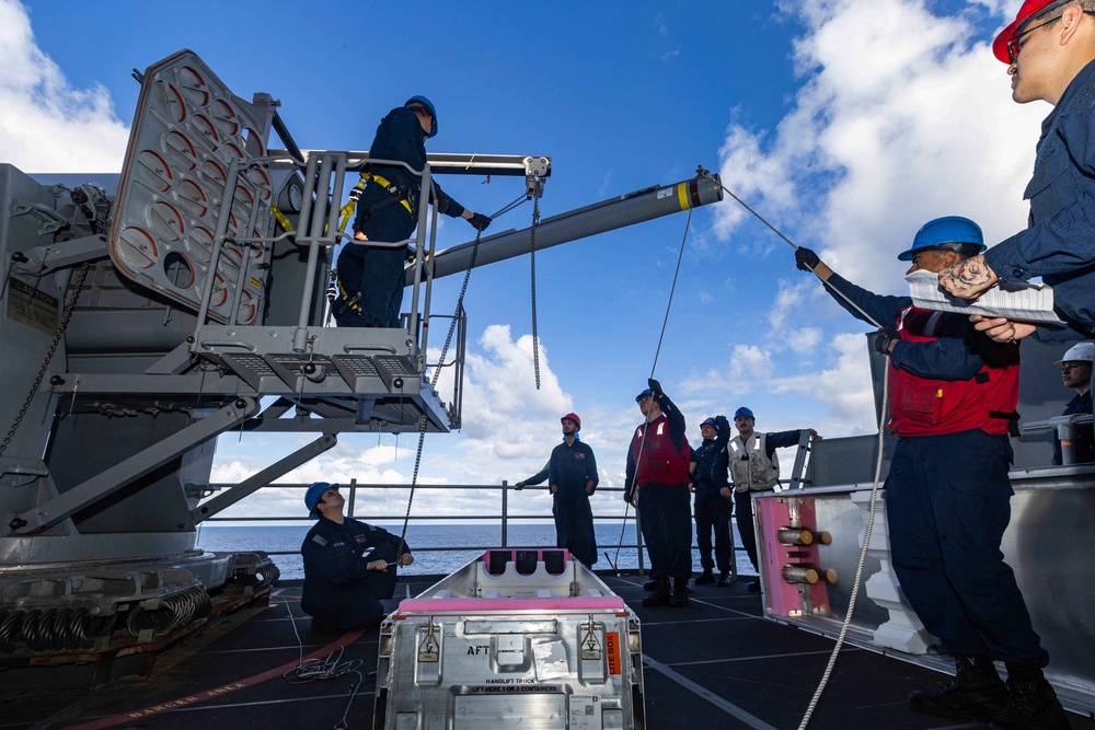 USS Gerald R. Ford (CVN 78) Sailors Load RAM Launcher