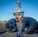 USS Carl Vinson (CVN 70) Sailors Apply Mobilith