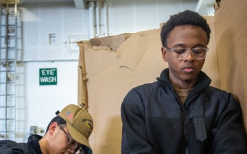 USS Carl Vinson (CVN 70) Sailors Prepare to Replace Washers and Dryers