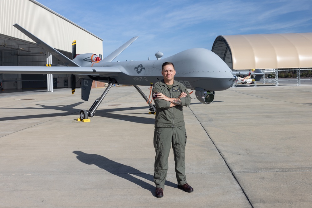 U.S. Marines with VMUT-2 conduct flight simulations and aircraft familiarization