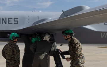 U.S. Marines with VMUT-2 conduct flight simulations and aircraft familiarization