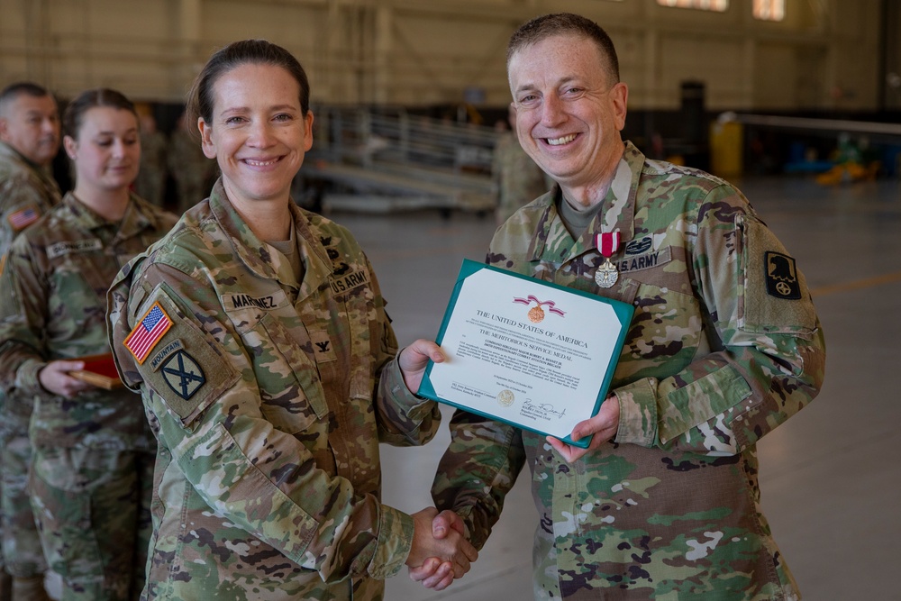 The 244th Expeditionary Combat Aviation Brigade honors CSM Bennet