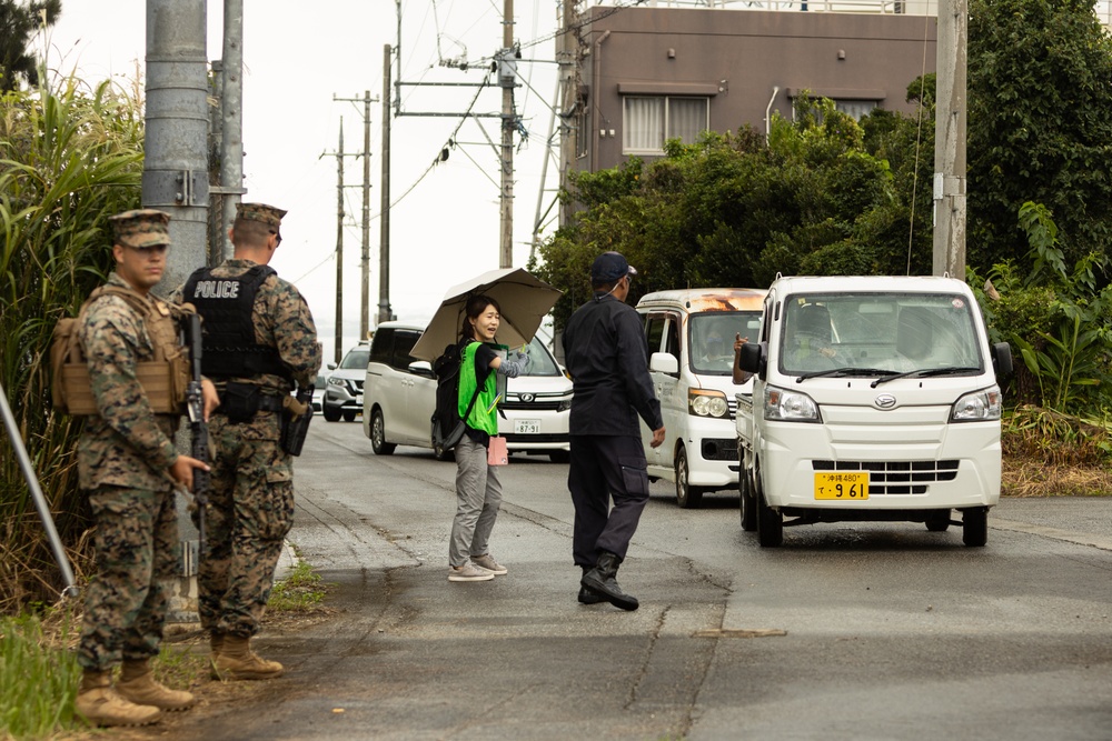 US Marines and Kin Town residents conduct a Tsunami Evacuation Drill on Camp Hansen