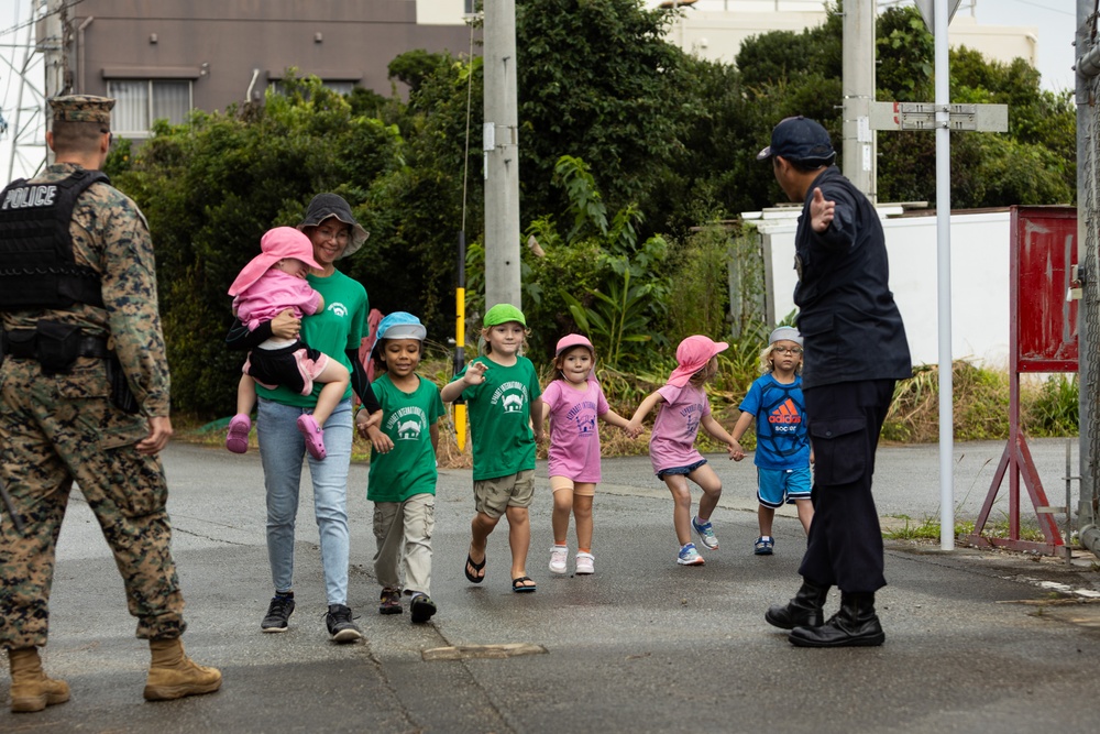 US Marines and Kin Town residents conduct a Tsunami Evacuation Drill on Camp Hansen