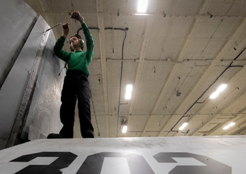 VFA 31Tomcatters Perform Maintenance in USS Gerald R. Ford's Hangar Bay