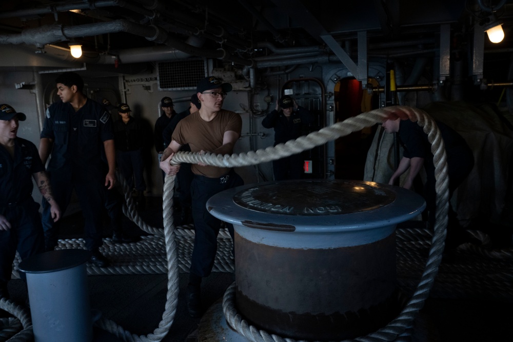 Nimitz Sailors Heave Around Line On The Fantail