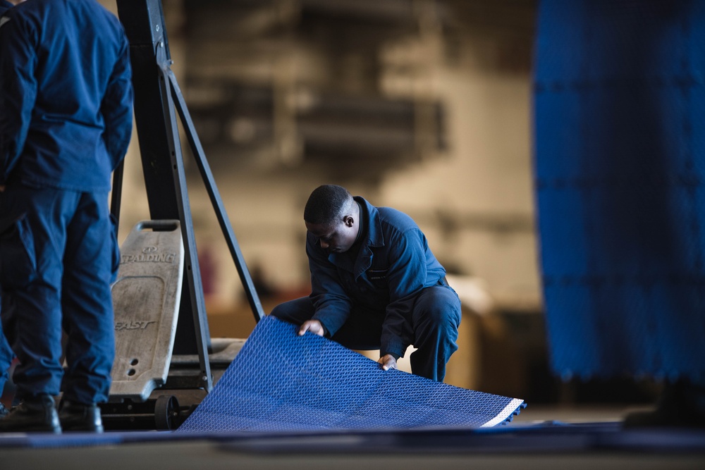 USS Ronald Reagan (CVN 76) MWR sets up a basketball court