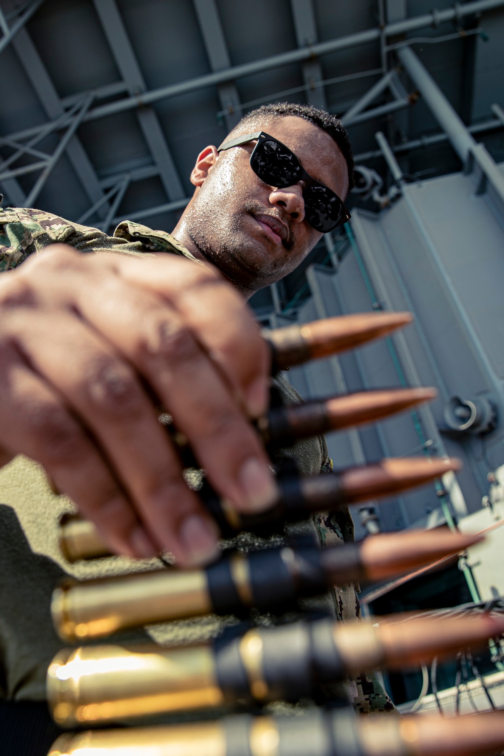 USS George Washington (CVN 73) Sailors conduct small arms gun shoot