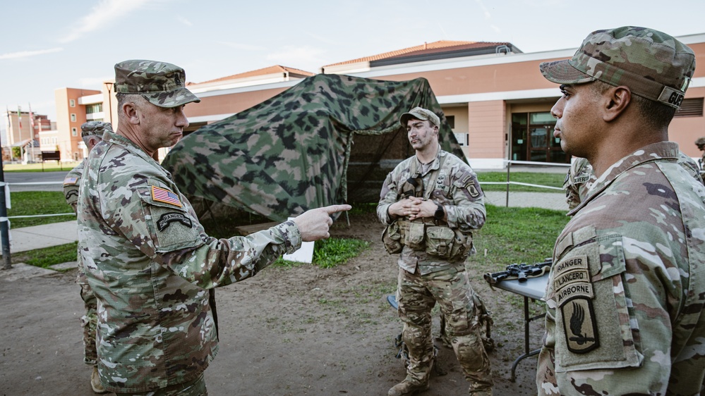 Command Sgt. Maj. Reese Teakell walks through E3B lanes
