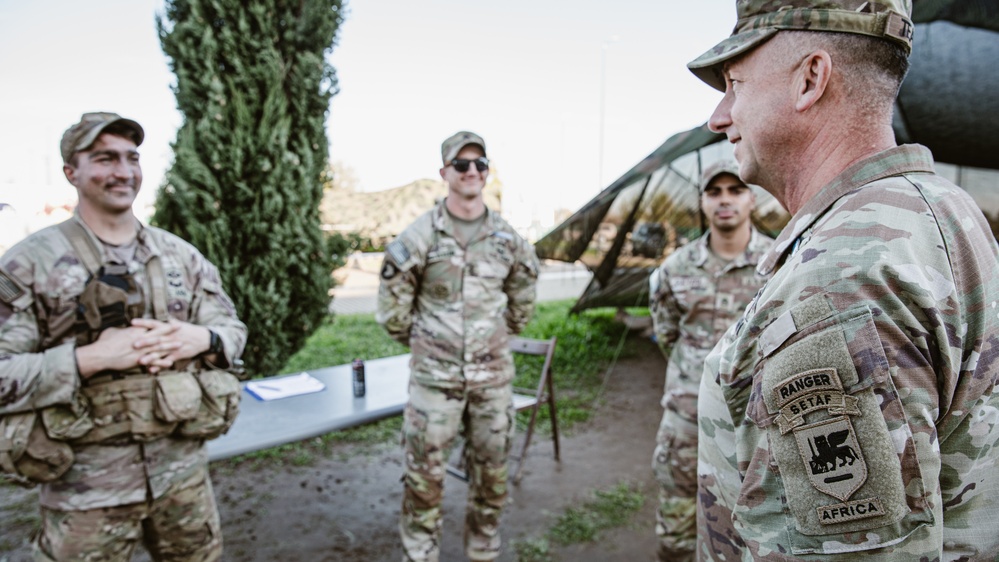 Command Sgt. Maj. Reese Teakell walks through E3B lanes