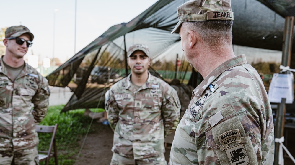 Command Sgt. Maj. Reese Teakell walks through E3B lanes