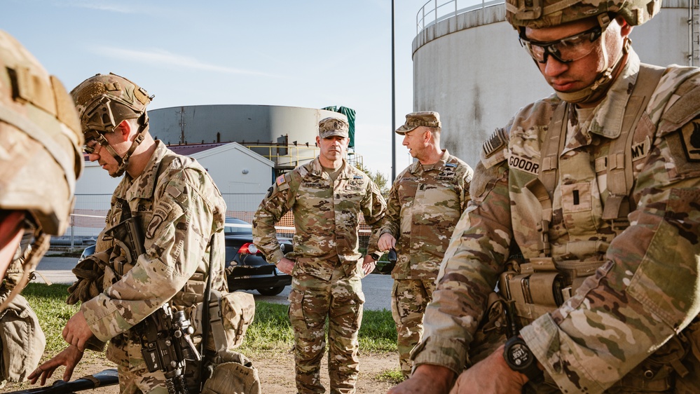 Command Sgt. Maj. Reese Teakell walks through E3B lanes