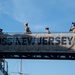 Sailors with USS John Basilone visit USS New Jersey