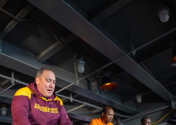 USS Ronald Reagan (CVN 76) Sailors participate in a Cycle-to-End-the-Cycle challenge