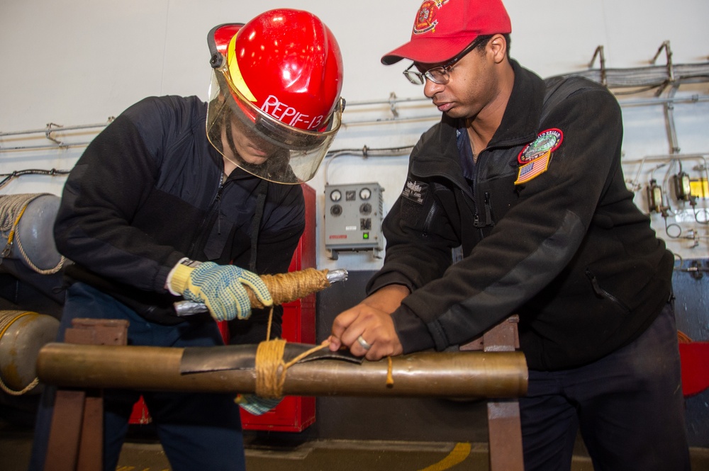 USS Ronald Reagan (CVN 76) conducts pipe patching training