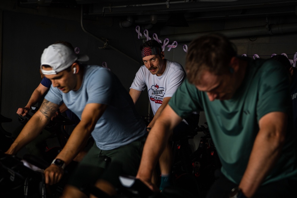 USS Ronald Reagan (CVN 76) Sailors participate in a Cycle-to-End-the-Cycle challenge