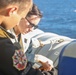 USS George Washington (CVN 73) conducts a fueling-at-sea with USS Higgins (DDG 76)