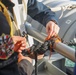 USS George Washington (CVN 73) conducts a fueling-at-sea with USS Higgins (DDG 76)