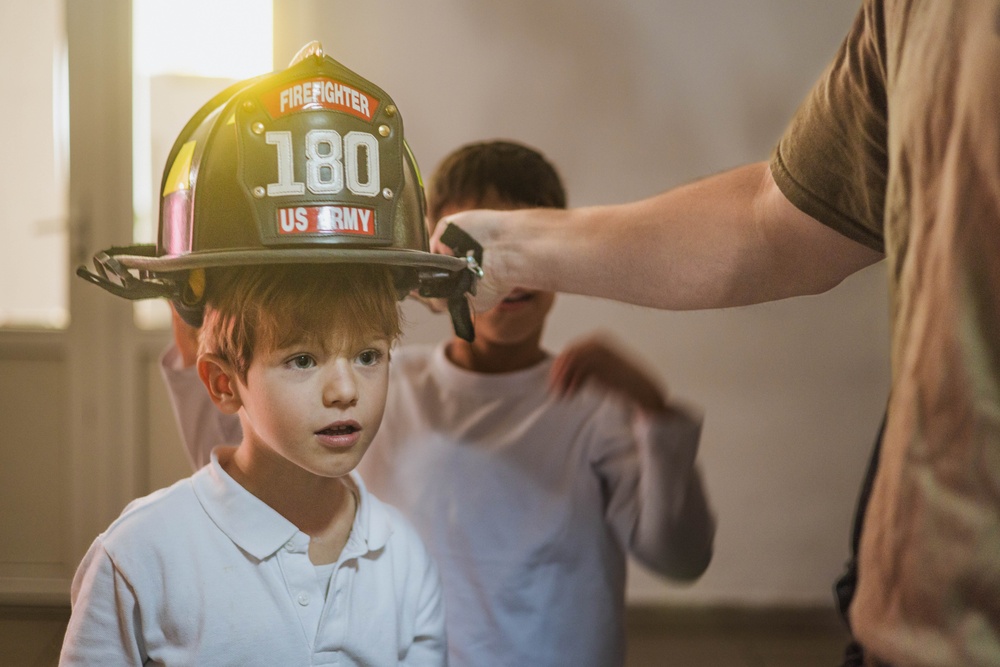 U.S. Army Firefighters Deployed to Romania Inspire Local Students During School Visit