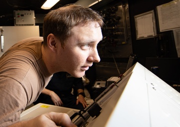 AIMD Sailors prepare and test jet engine aboard USS George Washington