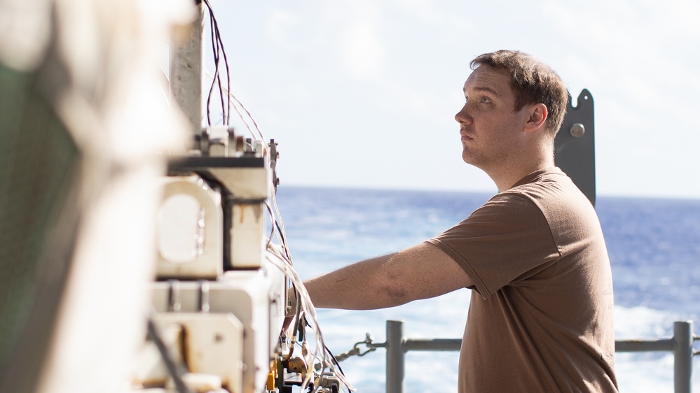 AIMD Sailors prepare and test jet engine aboard USS George Washington