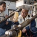 AIMD Sailors prepare and test jet engine aboard USS George Washington