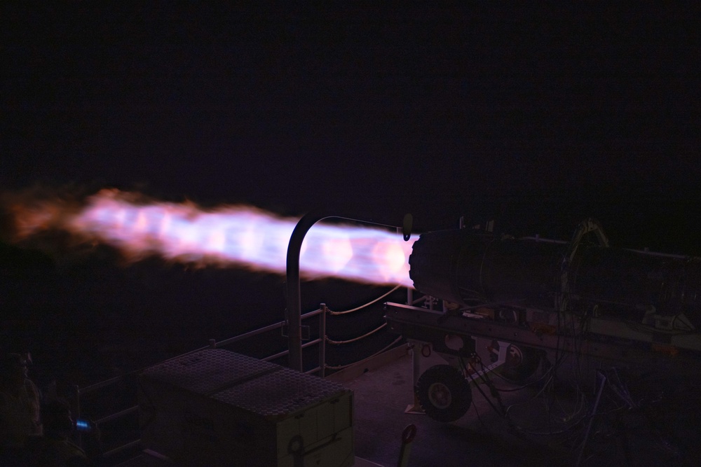 AIMD Sailors prepare and test jet engine aboard USS George Washington
