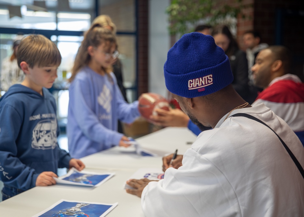 Former NFL Stars visit with Students in Vilseck