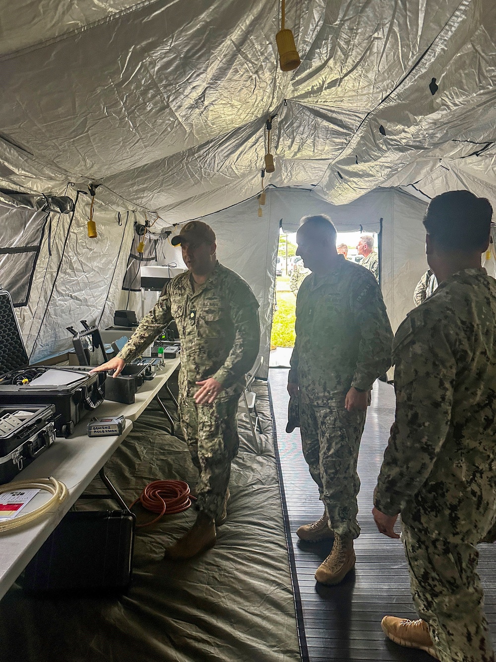 Navy Surgeon General Rear Admiral Darin Via and BUMED Force Master Chief PatrickPaul Mangaran toured Forward Deployable Preventive Medicine Unit Six