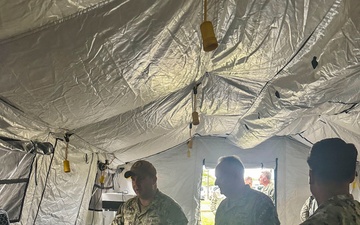 Navy Surgeon General Rear Admiral Darin Via and BUMED Force Master Chief PatrickPaul Mangaran toured Forward Deployable Preventive Medicine Unit Six