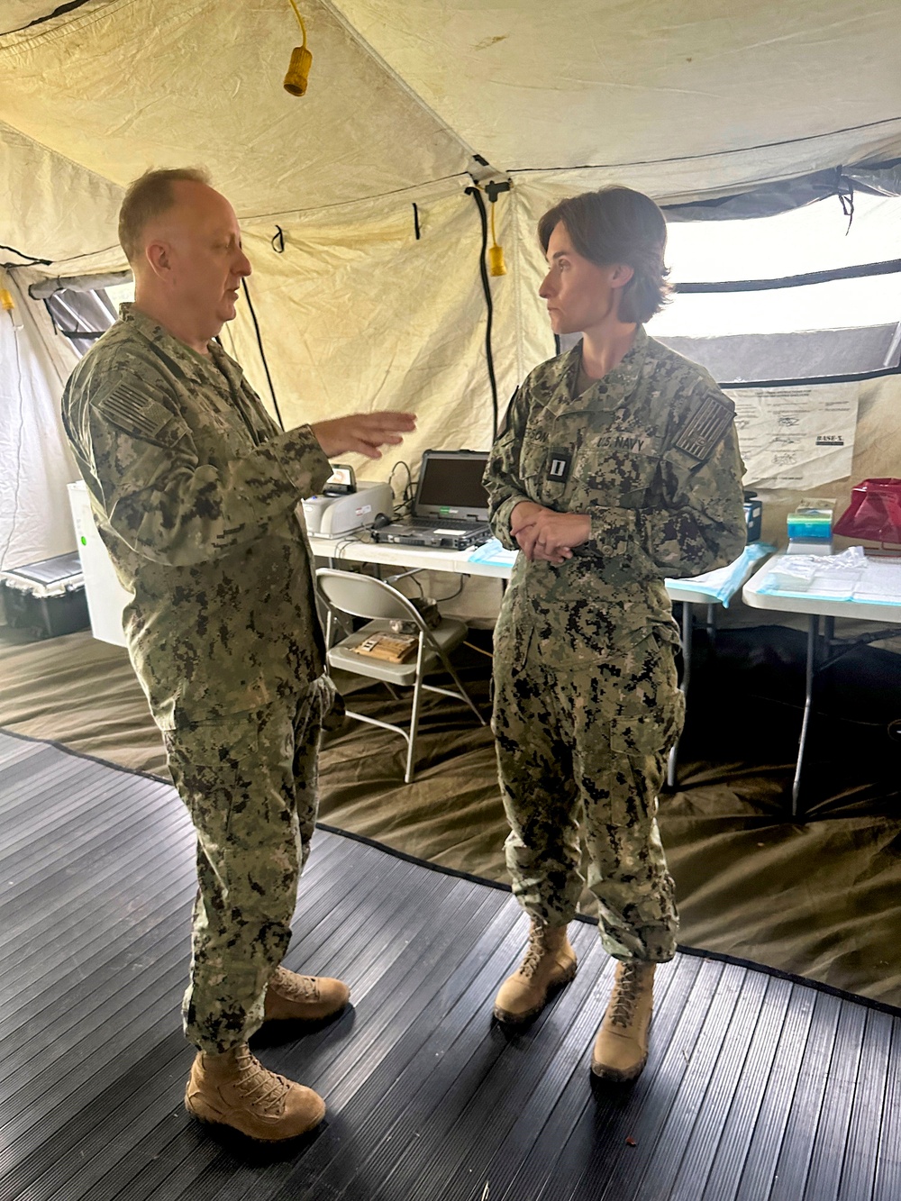 Navy Surgeon General Rear Admiral Darin Via and BUMED Force Master Chief PatrickPaul Mangaran toured Forward Deployable Preventive Medicine Unit Six