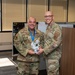 Chief Master Sgt. Select Christopher Burelle, Air Force Inspection Agency Nuclear Inspections superintendent, poses with Chief Master Sergeant Jessie Thomas