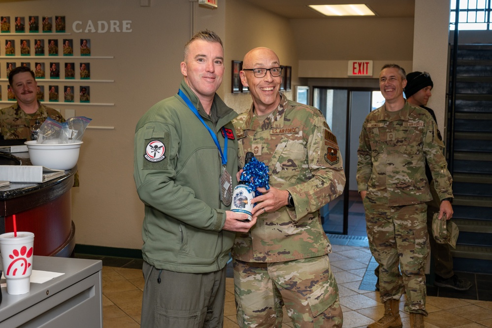 Chief Master Sgt. Select Donald Jones Jr, 512th Rescue Squadron senior enlisted leader, poses with Chief Master Sergeant Jessie Thomas