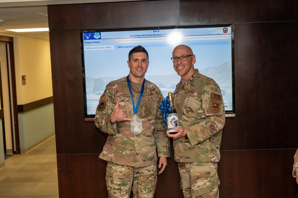 Chief Master Sgt. Select Dustin Longfellow, Air Force Operational Test and Evaluation Center senior enlisted leader, poses with Chief Master Sergeant Jessie Thomas