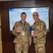 Chief Master Sgt. Select Dustin Longfellow, Air Force Operational Test and Evaluation Center senior enlisted leader, poses with Chief Master Sergeant Jessie Thomas