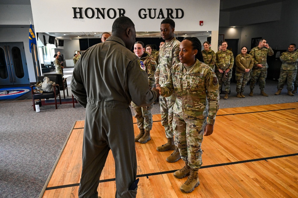 90 MW Base Honor Guard members coined