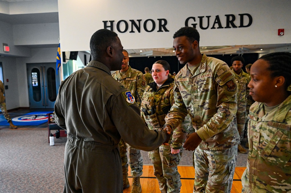 90 MW Base Honor Guard members coined