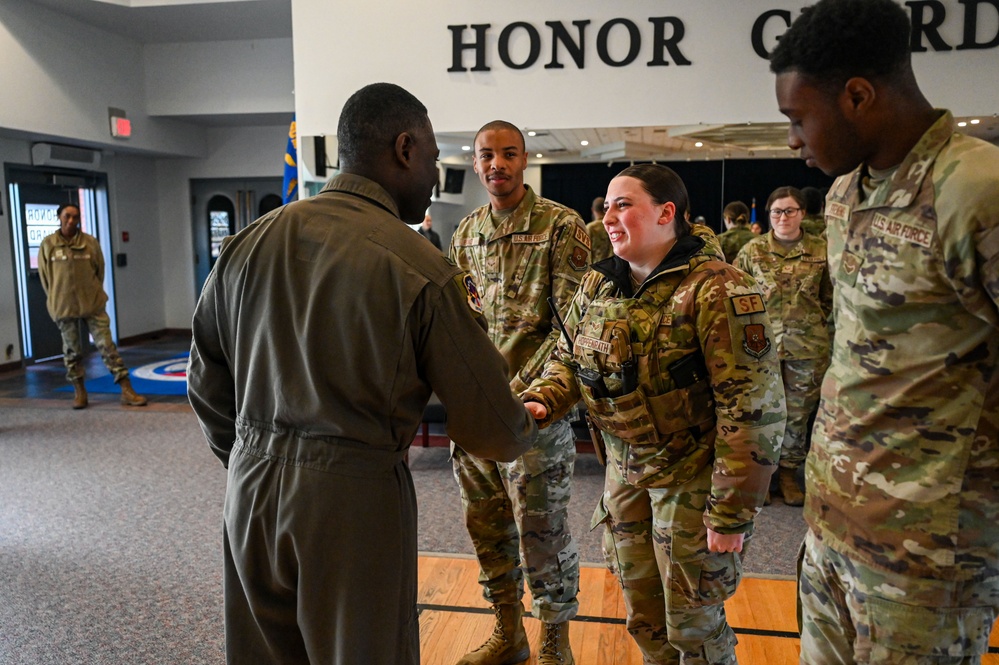 90 MW Base Honor Guard members coined