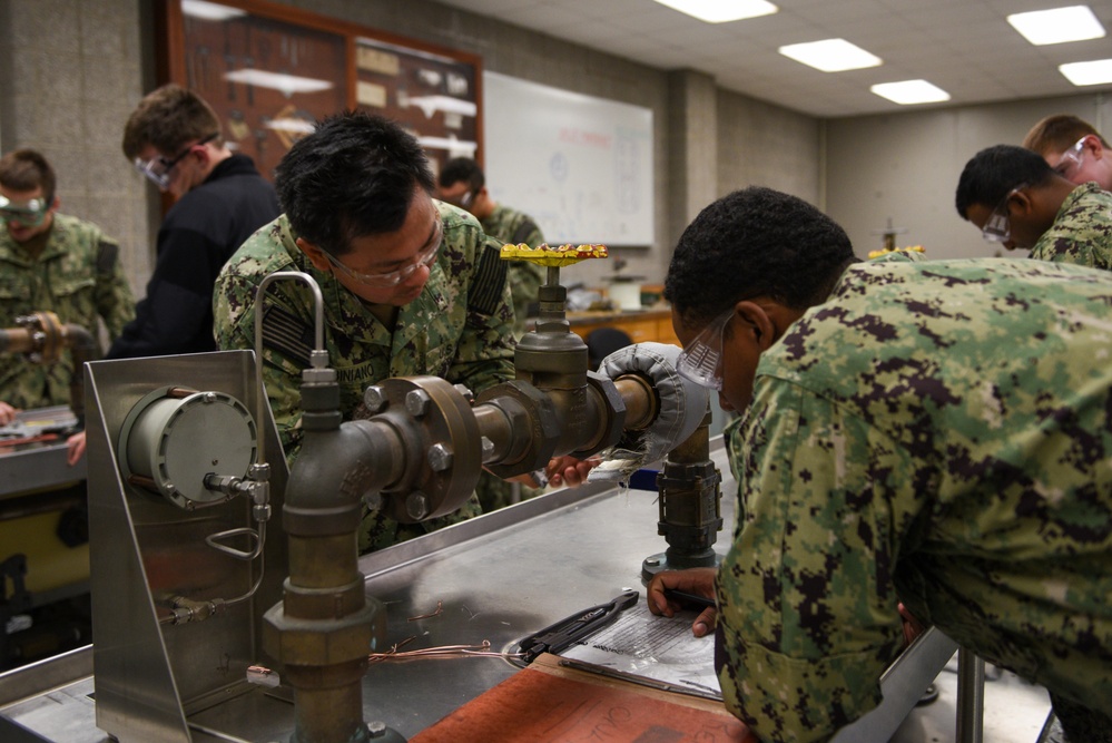 SWESC GL Accession-Level Sailors Practice Applying Flange Shield